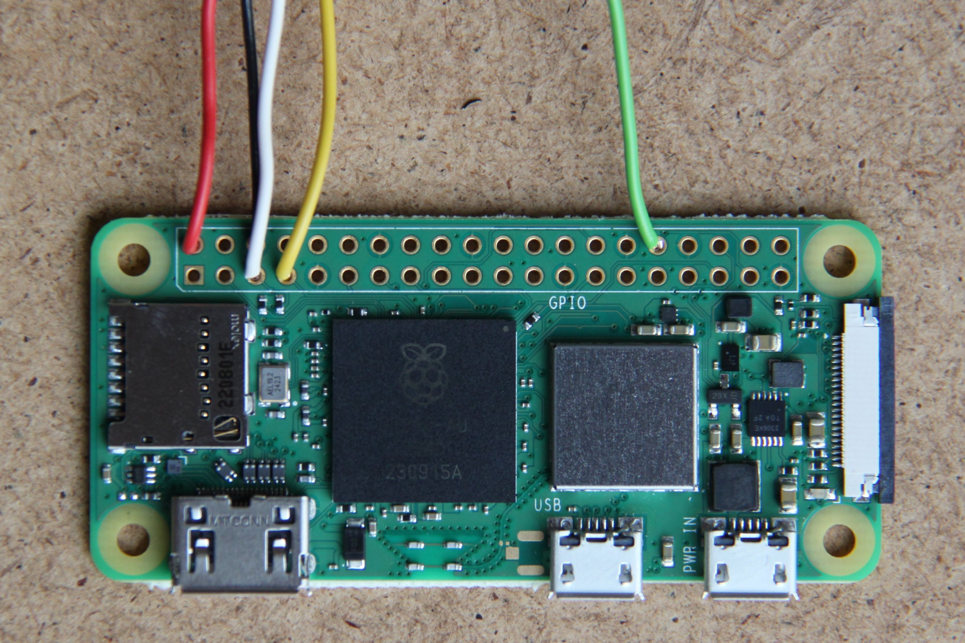 The Raspberry Pi Zero 2 W with soldered on wires.